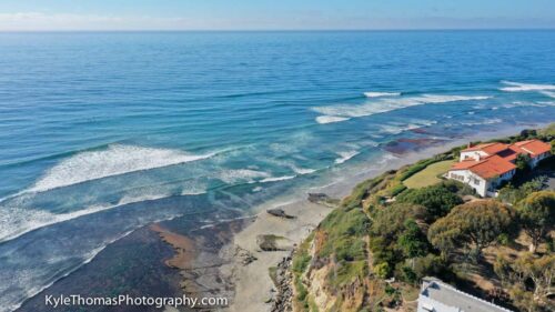 Aerial,View,above,Swamis,Beach,low-tide,ocean-reef,Self-Realization-Fellowship,Encinitas,California.