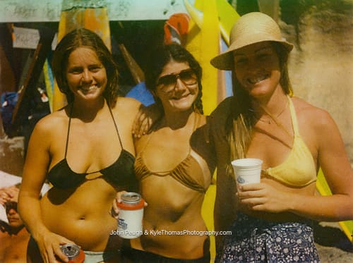 Three of them, cups up, boards behind
