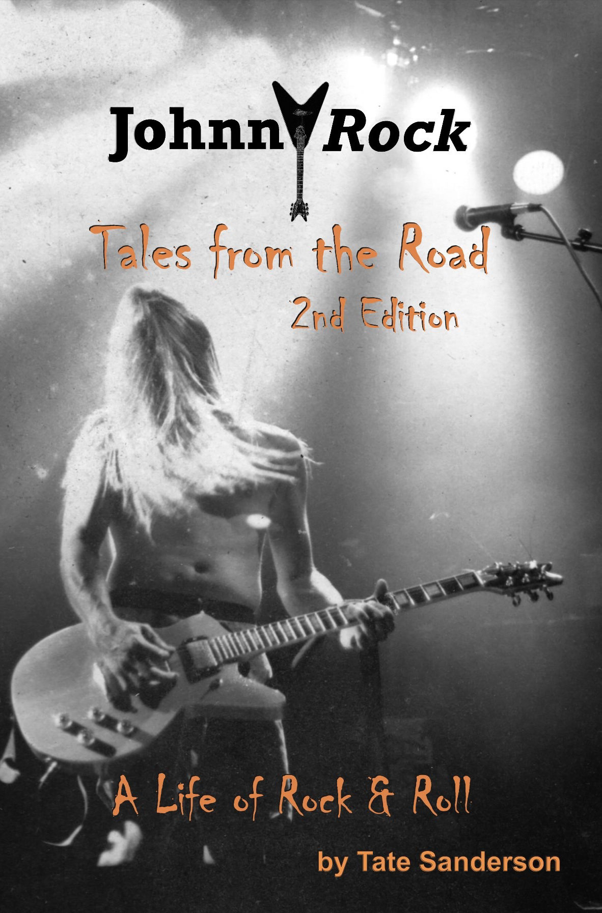 Cover of Johnny Rock: Tales from the Road, 2nd Edition, A Life of Rock and Roll by Tate Sanderson, showing a long-haired guitarist from behind under a stage light