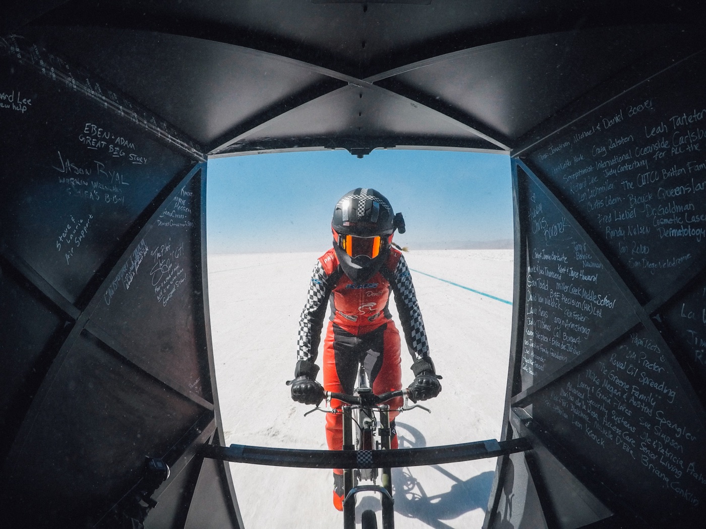 Denise Mueller drafting behind the Project Speed dragster on the Bonneville Salt Flats